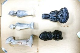 A collection of Ethnographic figures to include stone Buddha figure possibly black jade, together