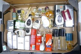 A mixed collection of items to including used perfumes, body lotions etc