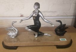 Art deco mantle centre piece of a lady and two swans on marble base (over painted)