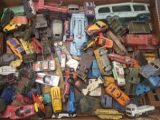 A large quantity of play-worn Dinky, Corgi and similar die-cast vehicles, including petrol pumps etc