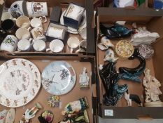 A mixed collection of ceramic items to include Poole pottery dolphin and whale figures, floral