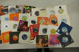 A large collection of 1970's & later 7" vinyl singles & ep's including Abba, David Bowie, Elvis