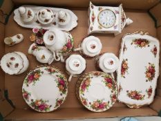 Royal Albert Old Country Roses pattern items to include 5 tea cups, 5 saucers, mantle clock, side