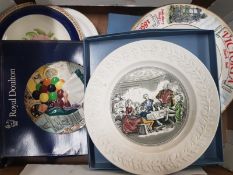 A mixed collection of decorative wall plates including Royal Doulton old balloon seller plate and