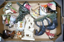 A mixed collection of items to include Leonardo Resin Figures, Coalport Pumpkin Carriage, Beswick