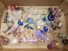 A good collection of perfume bottles and atomisers, some in art noveu and art deco style etc (1
