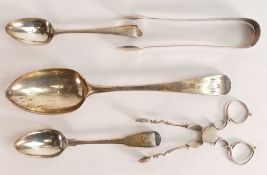 Five pieces of Georgian silver including sugar tongs, sugar nips, large serving spoon (probably