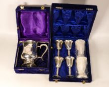 Two Boxed Pewter Items to include one engraved tankard and a set of six small cups (2)