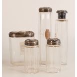 Five x matching hallmarked silver (London 1907) topped dressing table cut class jars. Silver and