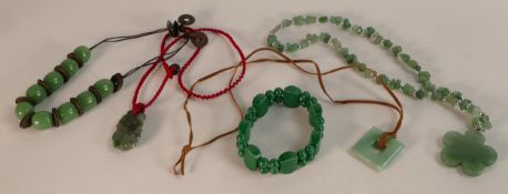 A small collection of Chinese hardstone and jade jewellery including pendants, bracelet, necklaces