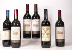 A collection of vintage Red Wines to include Raso De La Cruz, La Baume Merlot, 2001 Chateau Tour