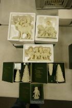 A collection of Boxed Department Branded Snow babies figures (6)