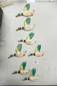 A collection of Wild Bird Theme Mid Century Wall Plaques, largest length 17cm(7)