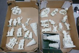 A collection of Department Branded Snow babies figures (2 trays)