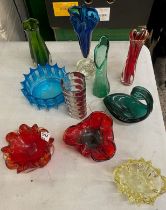 A collection of vintage art glass, including vases, shaped dishes in various colours, tallest vase