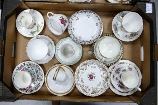 A collection of cups and saucers to include Royal Albert Violetta trio, Moss Ross cup & saucer,
