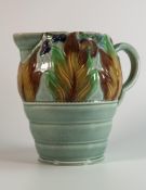Clarice Cliff Embossed Leaf & Berry patterned jug on Celadon Ground , height 19cm