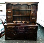 Reproduction Heavy Quality Oak Dresser. Six Lower Drawers and two Upper Cupboards. Height: approx.