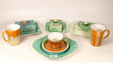 A collection of Shelley Harmony Drip Ware including Butter Dishes Sandwich Plates, Cups & Saucers,