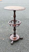 Victorian Side Table with spindled basket below and scrolled feet. Height: 72cm
