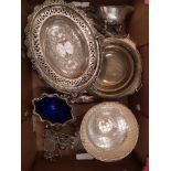 A mixed collection of silver plated items to include circular trays, condiment set, bon bon dish jug