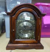 Modern mahogany cased Tempus Fugit mantle clock.