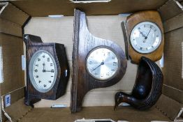 A collection of vintage wooden cased mantle clocks
