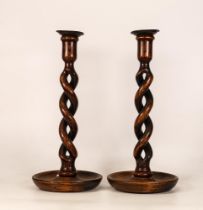 A Pair of Oak Open Twist Candlesticks. Height: 30.5cm