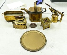 A collection of brass items to include burners, planters, watering can, Iron etc