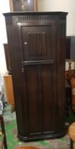 Early 20th century dark oak linen fold gents/hall wardrobe 80cm W x 186cm H