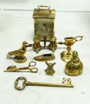 A mixed collection of brass items to include Candlestick, Carriage Clock, Condiment set etc