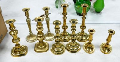A collection of Brass Candlesticks , tallest 27.5cm(10)