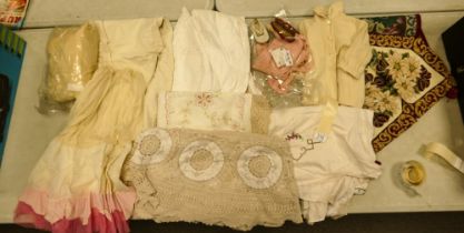 A collect of vintage linen & fabrics to include lace table cloths, Embroidered items, Christening