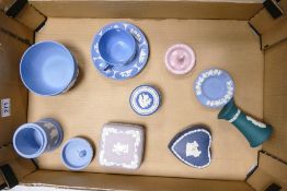 A collection of Wedgwood Jasperware including pink ring stand, Royal Blue lidded boxes, Teal Vase,