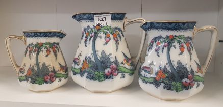 A Keelings & Co graduated set of Lolsol Ware jugs, tallest h.19cm. (3)