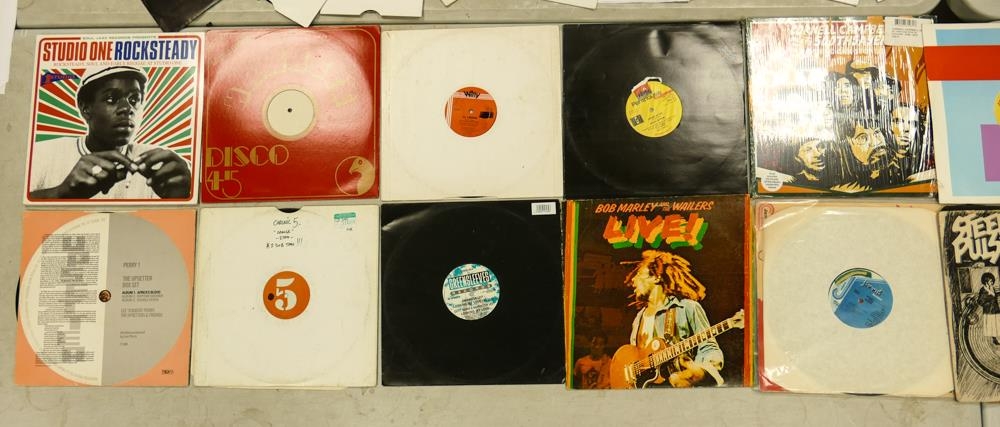 A collection of 1980's & later 12" Vinyl records including Dancehall, Reggae, Ska & Dub, some