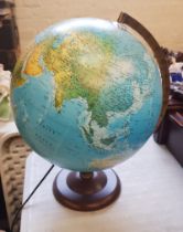 Danish made illuminating globe, overall height 39cm.