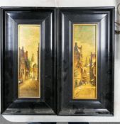 A Pair of Oil on Ceramic Paintings depicting Dutch Street Scenes in gilt and ebonized frames.
