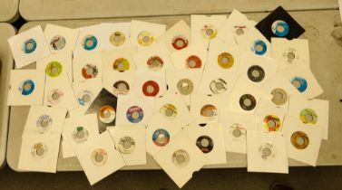 A collection of 35 1980's & later 7" Vinyl records including Dancehall, Reggae, Ska & Dub with