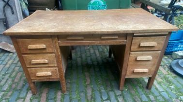 Mid century oak 6 drawer desk.