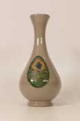 Moorcroft Peacock feather patterned vase. Height 16.5cm