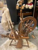 Oak bobbin twist spinning wheel,h.103cm.
