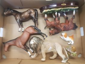 A mixed collection of items to include a Melba Ware lion figure, resin Crosa Collection horse and