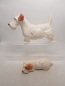 A collection of Beswick dogs to include a Seallyham Terrier standing together with a smaller lying