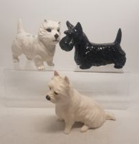 A collection of Beswick dogs to include West Highland Terrier x 2 and a Scottie Dog (3).