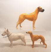 A collection of Beswick dogs to include English Bull Terrier Romany Rhinestone in matt, together a