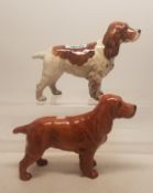A collection of Beswick dogs to include Cocker Spaniel 'Horseshoe Primula' together with a Cocker