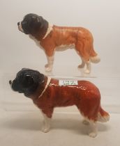 A collection of Beswick dogs to include St Bernard Cornasarth Stroller in glass together with a matt