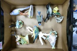 A collection of ceramic birds to include goldscheider , Goebel , crown Staffs Goldfinch by J T Jones