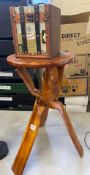 Carved african tripod table 63cm H together with vintage style storage box (2)